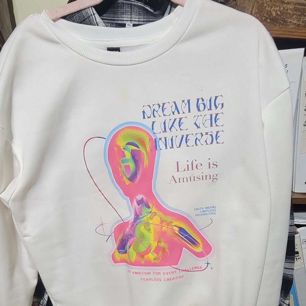 Multicolored sweater with printed design